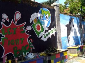 Saat Seniman Palabuhanratu Sampaikan Pesan Lawan Corona Lewat Mural