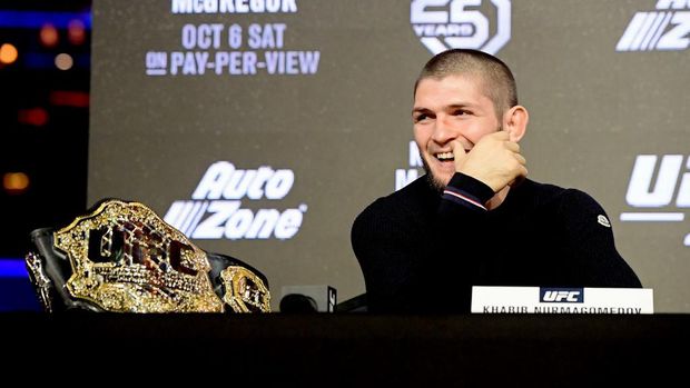 NEW YORK, NY - SEPTEMBER 20: Lightweight Champion Khabib Nurmagomedov reacts during the UFC 229 Press Conference at Radio City Music Hall on September 20, 2018 in New York City.   Steven Ryan/Getty Images/AFP