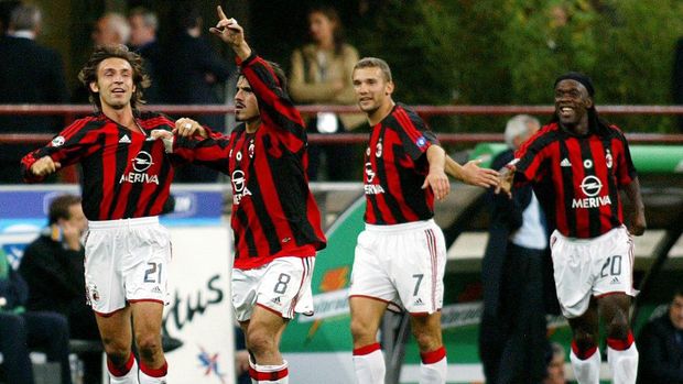 Milan AC's (fromL) Andrea Pirlo, Gennaro Gattuso, Andry Shevchenko and Clarence Seedorf celebrate after teammate Filippo Inzaghi scored the first goal against Inter Milan during their Italian Serie A match 05 October 2003 at San Siro stadium in Milan.  AFP PHOTO / PATRICK HERTZOG (Photo by PATRICK HERTZOG / AFP)