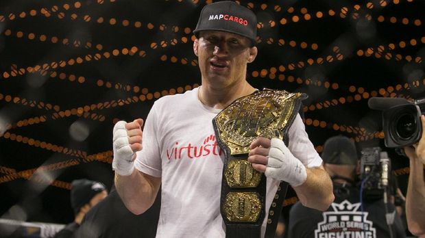 NEW YORK, NY - DECEMBER 31: Justin Gaethje celebrates his win over challenger Luis Firmino (not shown) after their World Series of Fighting lightweight championship fight at The Theater at Madison Square Garden on December 31, 2016 in New York City.   Ed Mulholland/Getty Images/AFP