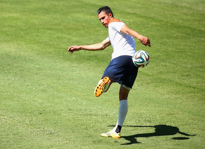 FORTALEZA, BRAZIL - JUNE 28:  Robin van Persie of the Netherlands kicks the ball during the Netherlands training session at the 2014 FIFA World Cup Brazil held at Estadio Presidente Vargas on June 28, 2014 in Fortaleza, Brazil.  (Photo by Robert Cianflone/Getty Images)