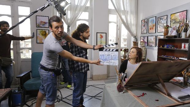 (FILES) In this file photo taken on May 13, 2017, Syrian actress Nadine Tahseen Beck is seen during the filming of the serial drama 