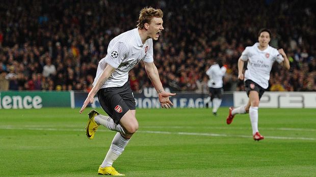 BARCELONA, SPAIN - APRIL 06: Nicklas Bendtner of Arsenal celebrates scoring the opening goal during the UEFA Champions League quarter final second leg match between Barcelona and Arsenal at Camp Nou on April 6, 2010 in Barcelona, Spain. (Photo by Jasper Juinen/Getty Images)