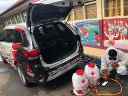 Mobil Listrik Mitsubishi Jadi Armada Penyemprot Disinfektan