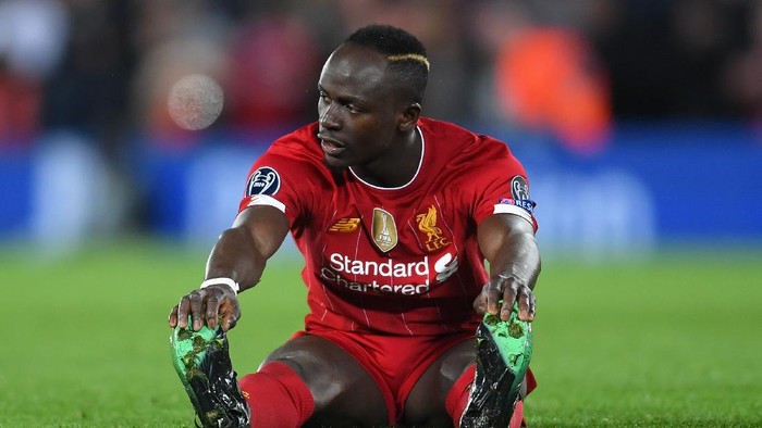 LIVERPOOL, ENGLAND - MARCH 11: Sadio Mane of Liverpool looks dejected during the UEFA Champions League round of 16 second leg match between Liverpool FC and Atletico Madrid at Anfield on March 11, 2020 in Liverpool, United Kingdom.  (Photo by Laurence Griffiths/Getty Images)