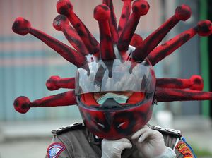 Kepolisian Sosialisasi Kenakan Masker Anti Virus Corona