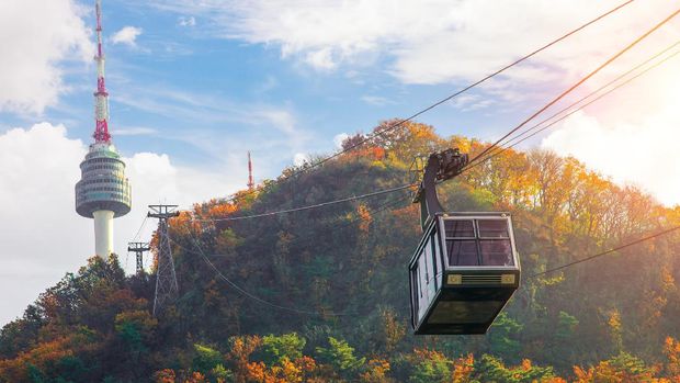 Namsan park Cable car to Seoul N tower with blue sky and autymn season, Seoul city, South Korea