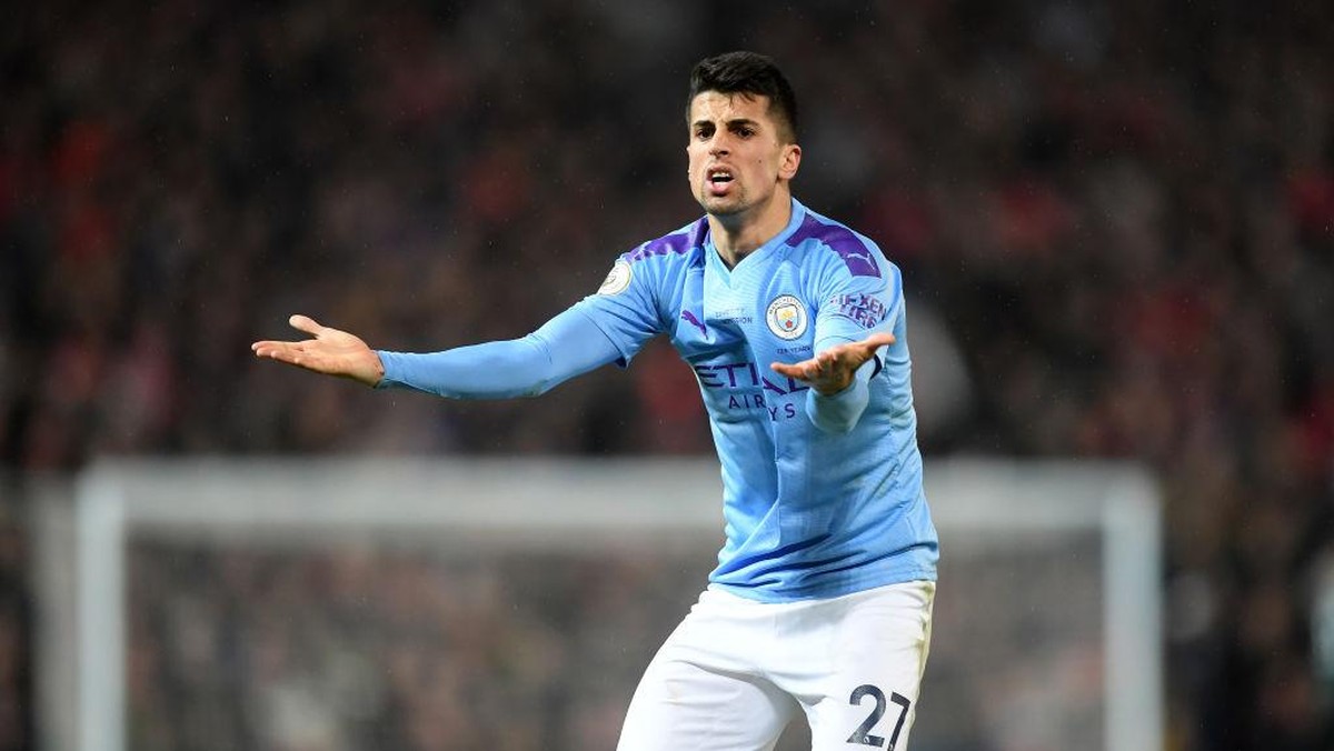 Cancelo jarang diturunkan Guardiola musim ini. Foto: Getty Images/Michael Regan