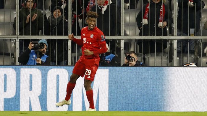 Coman Bayern Munichs French forward Kingsley Coman celebrates after scoring the first goal during the UEFA Champions League Group B football match between Bayern Munich and Tottenham FC on December 11, 2019 in Munich, Germany. (Photo by Odd ANDERSEN / AFP)