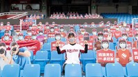 Kali ini dari tribun baseball di Taiwan yang baru akan menggelar pertandingan tertutupnya hari ini. Gene Wang/Getty Images