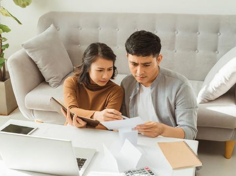 family having conflict fight about wasting money financial problem at home