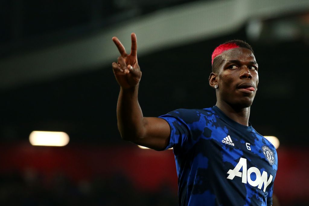 MANCHESTER, ENGLAND - SEPTEMBER 25:  Paul Pogba of Manchester United warms up prior to the Carabao Cup Third Round match between Manchester United and Rochdale AFC at Old Trafford on September 25, 2019 in Manchester, England. (Photo by Alex Livesey/Getty Images)
