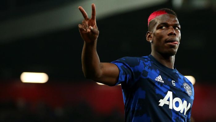 Pogba MANCHESTER, ENGLAND - SEPTEMBER 25: Paul Pogba of Manchester United warms up prior to the Carabao Cup Third Round match between Manchester United and Rochdale AFC at Old Trafford on September 25, 2019 in Manchester, England. (Photo by Alex Livesey/Getty Images)