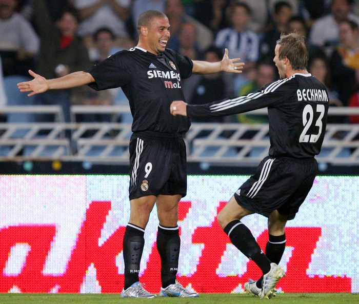 SAN SEBASTIAN, SPAIN - APRIL 30:  Real Madrids Ronaldo Luiz Nazario de Lima #9 celebrates scoring a goal with David Beckham #23 during a La Liga match between Real Sociedad and Real Madrid at the Anoeta stadium on April 30, 2005 in San Sebastian, Spain. Madrid won 2-0.  (Photo by Denis Doyle/Getty Images)