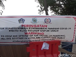 Nekat! Pasangan Bule Lompat Pagar Masuk Pantai Kuta Saat Pandemi Corona