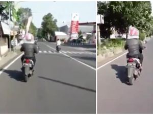 Viral Video Pengendara Motor Pakai Plastik Menutupi Kepala Cegah Corona