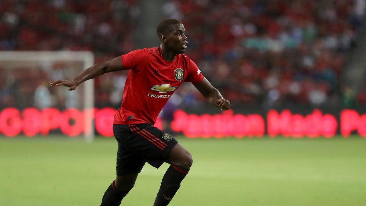 Paul Pogba tak peduli dengan kritik yang mengarah kepadanya (Lionel Ng/Getty Images)