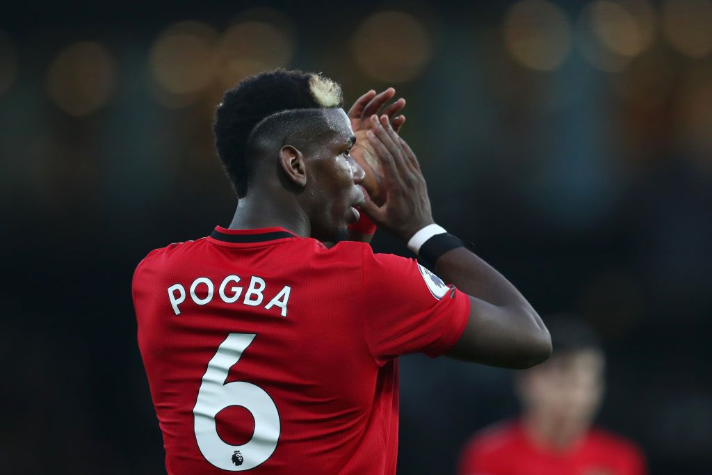 WATFORD, ENGLAND - DECEMBER 22: Paul Pogba of Manchester United applauds fans following his team's defeat in the Premier League match between Watford FC and Manchester United at Vicarage Road on December 22, 2019 in Watford, United Kingdom. (Photo by Dan Istitene/Getty Images)