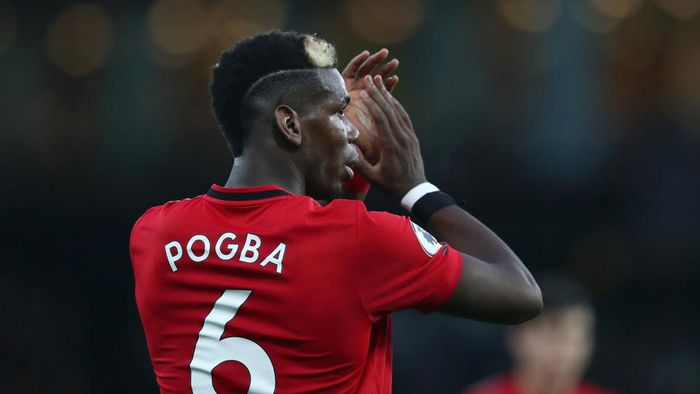 Paul Pogba WATFORD, ENGLAND - DECEMBER 22: Paul Pogba of Manchester United applauds fans following his teams defeat in the Premier League match between Watford FC and Manchester United at Vicarage Road on December 22, 2019 in Watford, United Kingdom. (Photo by Dan Istitene/Getty Images)