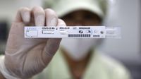 Intip Produksi Massal Alat Tes Corona di Korsel