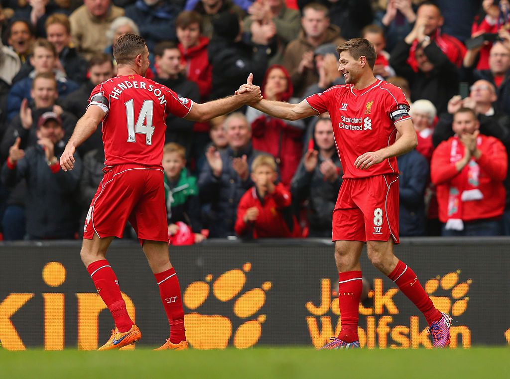 LIVERPOOL, ENGLAND - MAY 02:  Steven Gerrard of Liverpool celebrates his goal with Jordan Henderson during the Barclays Premier League match between Liverpool and Queens Park Rangers at Anfield on May 2, 2015 in Liverpool, England.  (Photo by Alex Livesey/Getty Images)