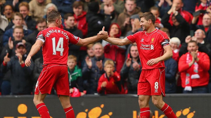 LIVERPOOL, ENGLAND - MAY 02:  Steven Gerrard of Liverpool celebrates his goal with Jordan Henderson during the Barclays Premier League match between Liverpool and Queens Park Rangers at Anfield on May 2, 2015 in Liverpool, England.  (Photo by Alex Livesey/Getty Images)