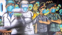 Aksi Peringatan Wabah COVID-19 Melalui Mural