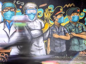 Aksi Peringatan Wabah COVID-19 Melalui Mural