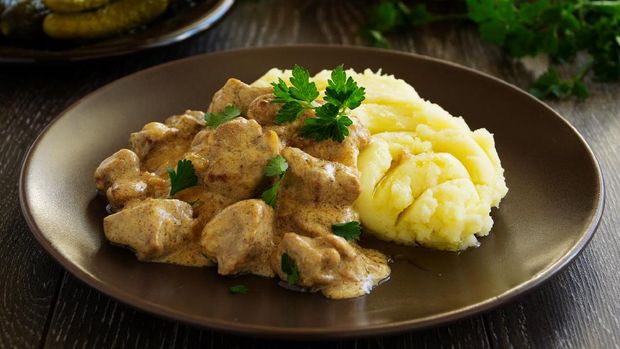 Beef Stroganoff with mashed potatoes.