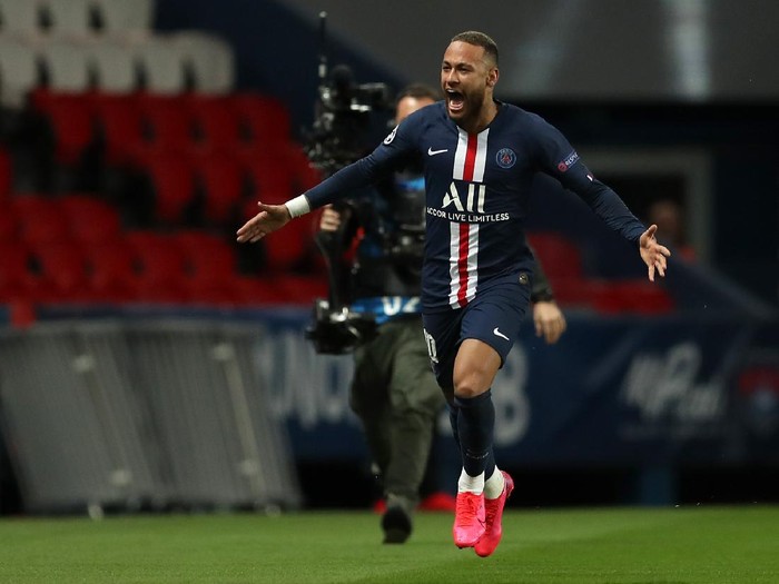 PARIS, FRANCE - MARCH 11: (FREE FOR EDITORIAL USE) In this handout image provided by UEFA, Neymar of Paris Saint-Germain celebrates after scoring his team's first goal during the UEFA Champions League round of 16 second leg match between Paris Saint-Germain and Borussia Dortmund at Parc des Princes on March 11, 2020 in Paris, France. The match is played behind closed doors as a precaution against the spread of COVID-19 (Coronavirus).  (Photo by UEFA - Handout/UEFA via Getty Images)