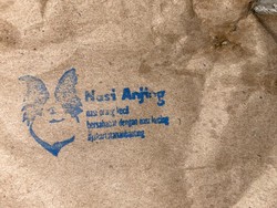 Polisi Selidiki Kasus Pembagian Makanan Berlogo Kepala Anjing di Jakut