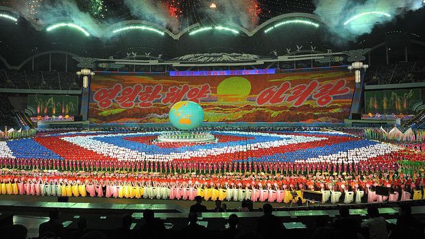 PYONGYANG, NORTH KOREA - OCTOBER 3: North Korean workers and students perform North Korea's biggest spectacle called the Arirang, at the May Day stadium, during the inter-Korea summit on October 3, 2007 in Pyongyang, North Korea. South Korean president Roh Moo-Hyun and North Korean leader Kim Il Jong are holding a three day summit aimed at ending the half-century of animosity between the two states that have remained technically at war since 1950. (Photo by Pool/Getty Images)