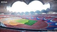 Jumlah itu sendiri sudah menjadikannya sebagai stadion olahraga terbesar di muka Bumi. Lebih besar ketimbang Stadion Sardar Patel (110.000) yang biasa menghelat Kriket di India bahkan Stadion Camp Nou (99,354) yang kondang sebagai kandangnya FC Barcelona. Istimewa/Dok. KCNA via stadiumdb.com.