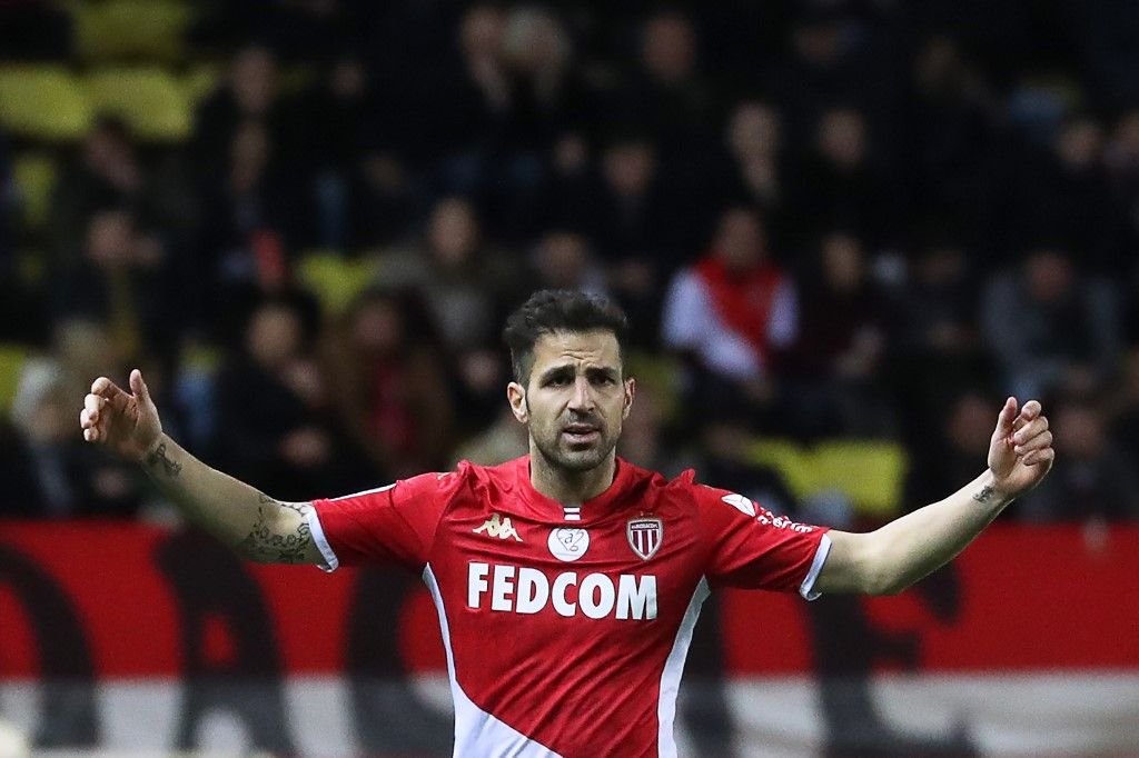 Monaco's Spanish midfielder Cesc Fabregas reacts  during the French L1 football match between Monaco (ASM) and Paris Saint-Germain (PSG) at the Louis II Stadium in Monaco on January 15, 2020. (Photo by Valery HACHE / AFP)