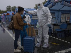 China Berjibaku Cegah Gelombang Kedua Virus Corona China Berjibaku Cegah Gelombang Kedua Virus Corona