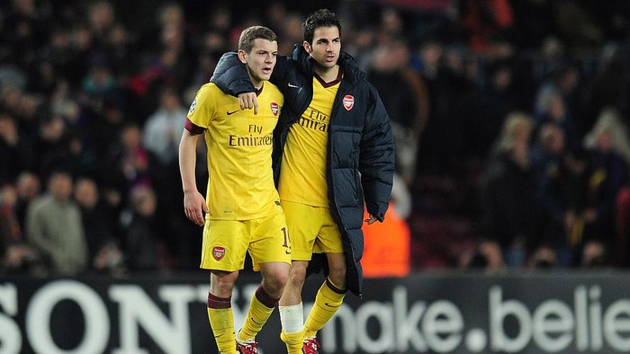 BARCELONA, SPAIN - MARCH 08:  Jack Wilshere and Cesc Fabregas of Arsenal leave the field at the end of the UEFA Champions League round of 16 second leg match between Barcelona and Arsenal at the Nou Camp Stadium on March 8, 2011 in Barcelona, Spain.  (Photo by Shaun Botterill/Getty Images)