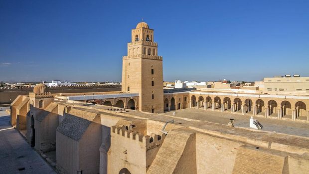 Tunisia - Kairouan - The panoramic view of fortress-like Great Mosque aka the Mosque of Sidi-Uqba and its minaret (built 9th century) are listed as UNESCO World Heritage and is one of the most impressive and largest Islamic monuments in North Africa