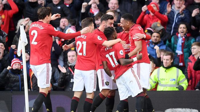 Manchester United MANCHESTER, ENGLAND - MARCH 08: Anthony Martial of Manchester United celebrates with his team after scoring his sides first goal during the Premier League match between Manchester United and Manchester City at Old Trafford on March 08, 2020 in Manchester, United Kingdom. (Photo by Michael Regan/Getty Images)