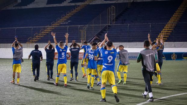 MANAGUA, NICARAGUA - APRIL 29: Players of Nicaraguan soccer team Managua FC celebrate after winning with their fans during the second leg semifinal match between Managua FC and Walter Ferretti as part of Nicaraguan Liga Primera at Estadio Nacional on April 29, 2020 in Managua, Nicaragua. Sports continue in Nicaragua despite most countries have stopped all public gatherings due to the spread of COVID-19.  (Photo by Inti Ocon/Getty Images)
