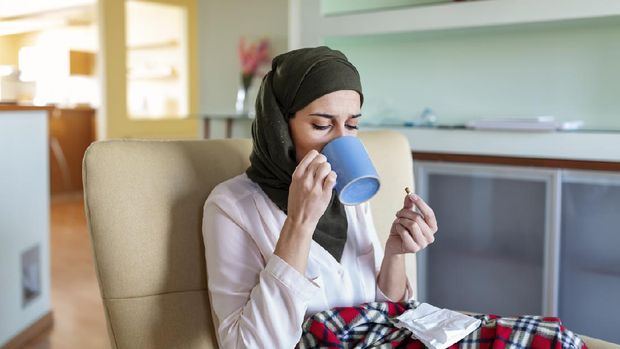 Ilustrasi minum pil penunda haid selama bulan Ramadhan