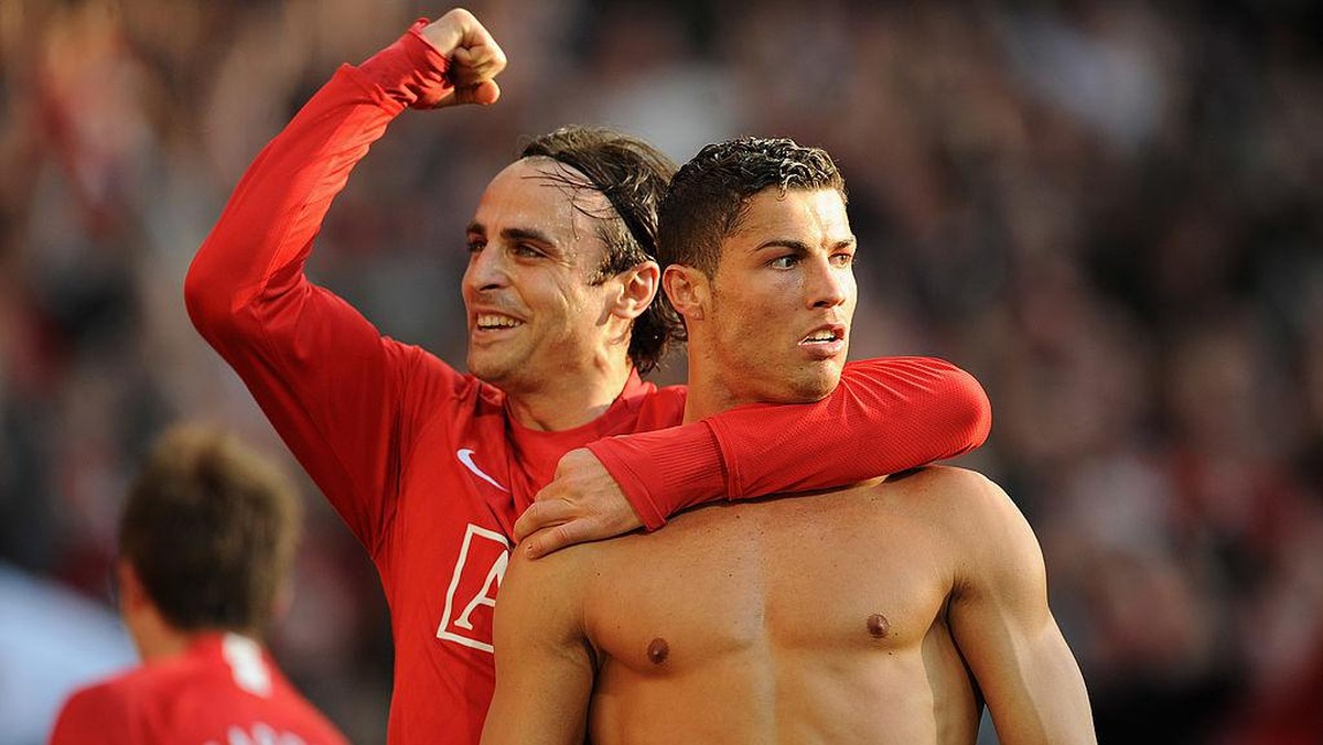 Dimitar Berbatov (kiri) merayakan gol bersama Cristiano Ronaldo. (Foto: Getty Images/Shaun Botterill)