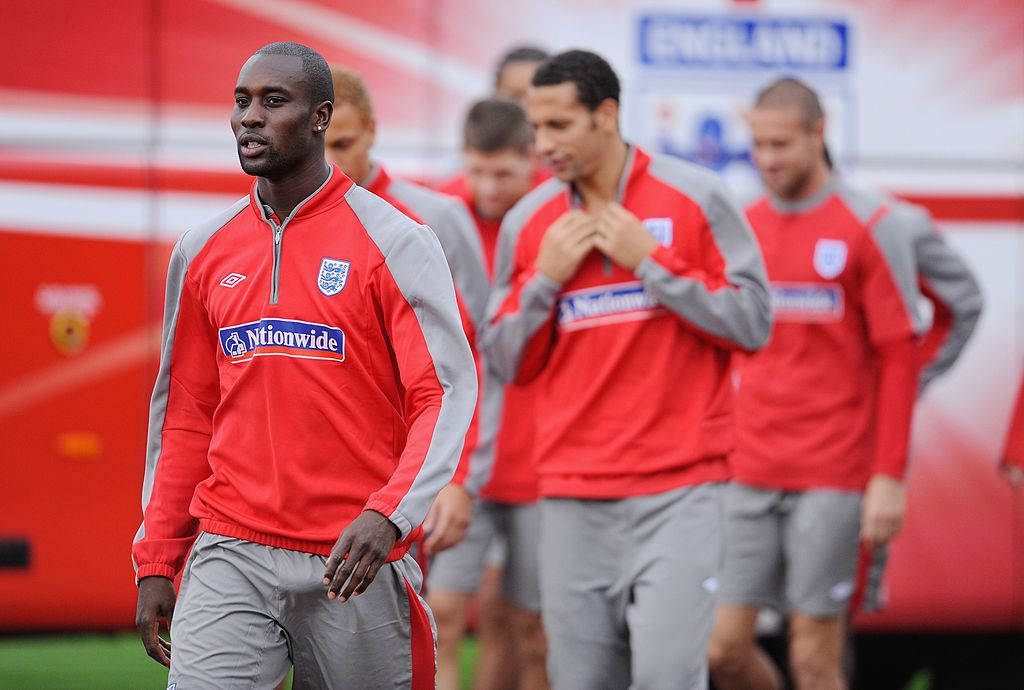 ST ALBANS, ENGLAND - OCTOBER 06: Carlton Cole makes his way out to the England training session at London Colney on October 6, 2009 in St Albans, England.  (Photo by Michael Regan/Getty Images)
