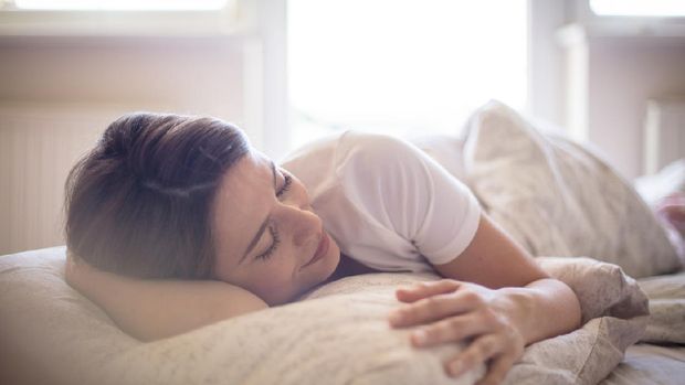 There's nothing better than a lie in. Woman sleeping in bed.