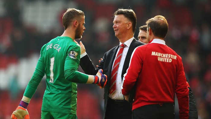 LIVERPOOL, ENGLAND - MARCH 22:  Louis van Gaal, manager of Manchester United celebrates victory with David De Gea of Manchester United after the Barclays Premier League match between Liverpool and Manchester United at Anfield on March 22, 2015 in Liverpool, England.  (Photo by Alex Livesey/Getty Images)