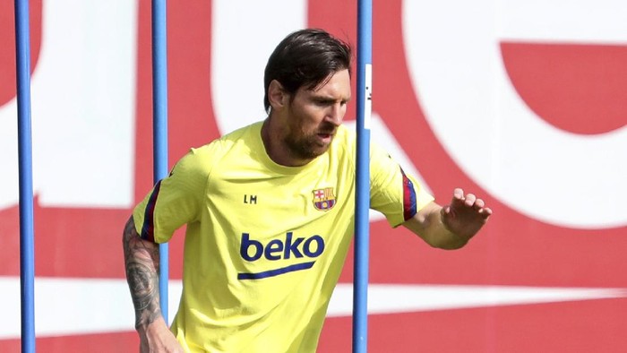 In this photo provided by FC Barcelona, Barcelonas Lionel Messi trains in Barcelona, Spain, on Friday May 8, 2020. Soccer players in Spain returned to train for the first time since the country entered a lockdown nearly two months ago because of the coronavirus pandemic. (Miguel Ruiz/FC Barcelona via AP)