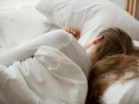 There's nothing better than a lie in. Woman sleeping in bed.