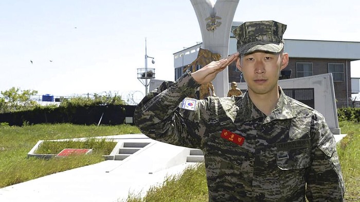 In this undated photo provided by South Korea Marine Corps Facebook on Friday, May 8, 2020, Tottenham Hotspur forward Son Heung-min salutes at a Marine Corps boot camp in Seogwipo on Jeju Island, South Korea. Son finished his three-week military training in South Korea on Friday and was right near the top of the class.(South Korea Marine Corps Facebook via AP).