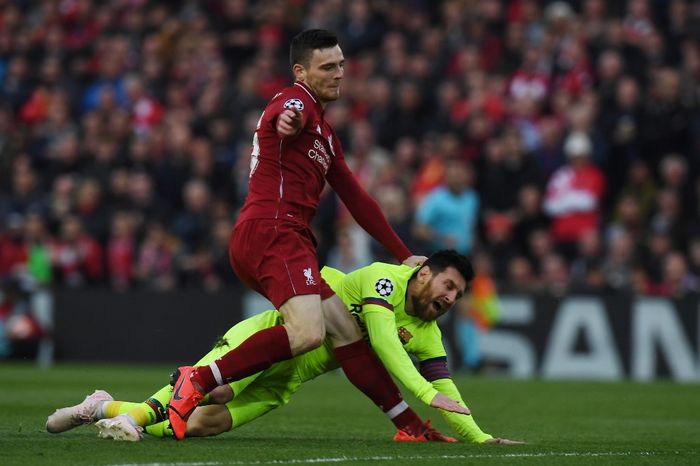 Robertson Messi Barcelonas Argentinian striker Lionel Messi (R) is tackled by Liverpools Scottish defender Andrew Robertson during the UEFA Champions league semi-final second leg football match between Liverpool and Barcelona at Anfield in Liverpool, north west England on May 7, 2019. (Photo by Paul ELLIS / AFP)