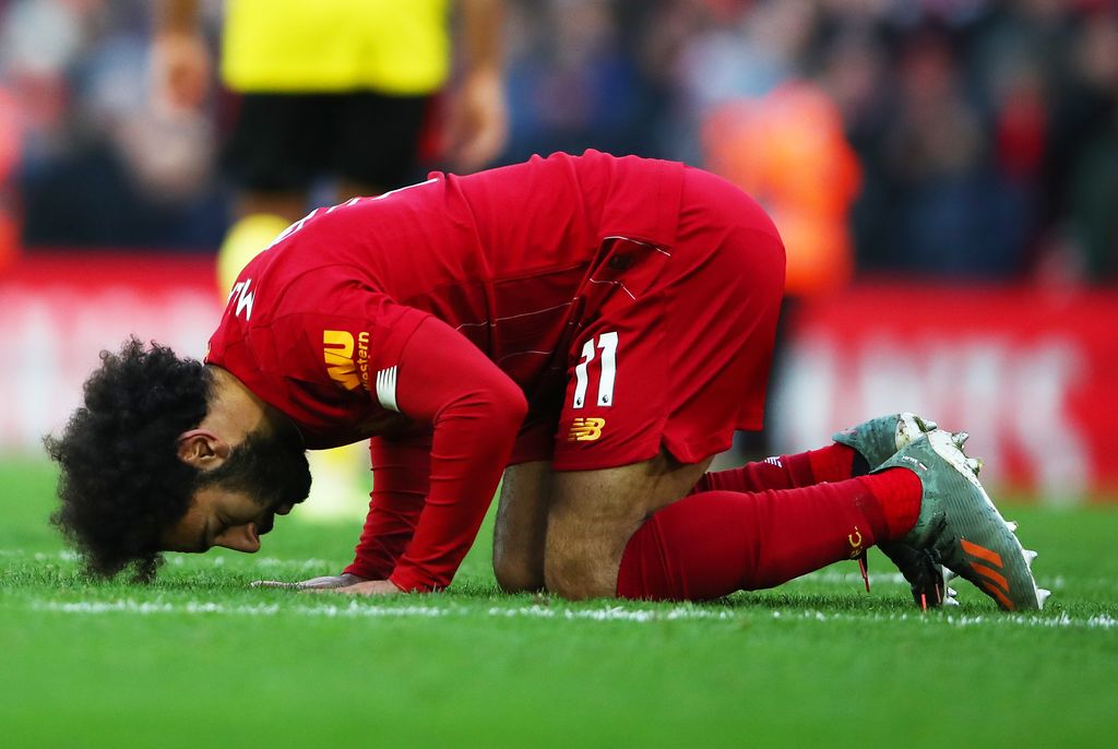 LIVERPOOL, ENGLAND - DECEMBER 14: Mohamed Salah of Liverpool celebrates after scoring his teams second goal during the Premier League match between Liverpool FC and Watford FC at Anfield on December 14, 2019 in Liverpool, United Kingdom. (Photo by Clive Brunskill/Getty Images)