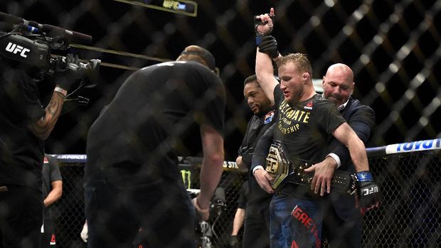 JACKSONVILLE, FLORIDA - MAY 09: Justin Gaethje of the United States celebrates after defeating Tony Ferguson of the United States in their Interim lightweight title fight during UFC 249 at VyStar Veterans Memorial Arena on May 09, 2020 in Jacksonville, Florida. Douglas P. DeFelice/Getty Images/AFP